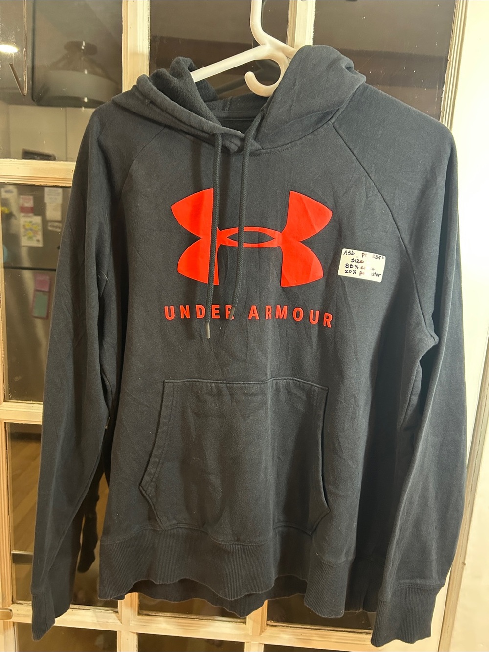 A56.    Under Armour Black Hoodie with Red Logo